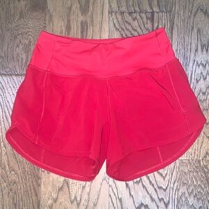 Size 4 Lululemon high rise Speed Up lined shorts. In demand color.